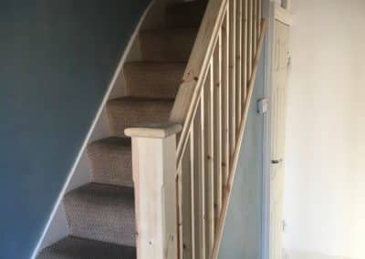 Stairwell up to loft conversion. pale carpets