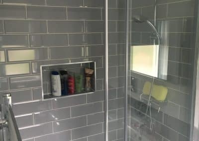 Grey tiled walk in shower bathroom extension