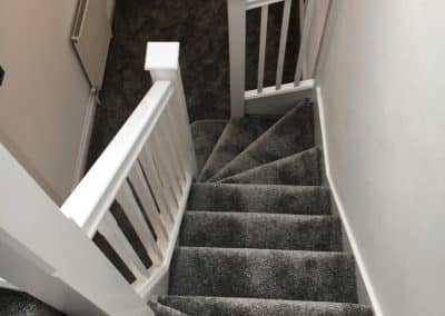 Birdseye view of staircase to loft conversion with grey carpet