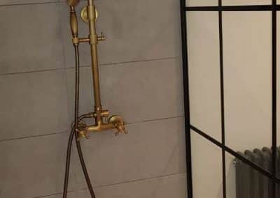 Antique fitted shower with glass surround
