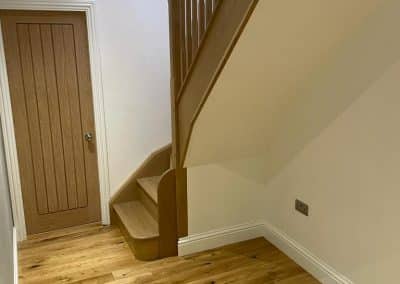 Staircase to loft - wooden mid-brown satirs